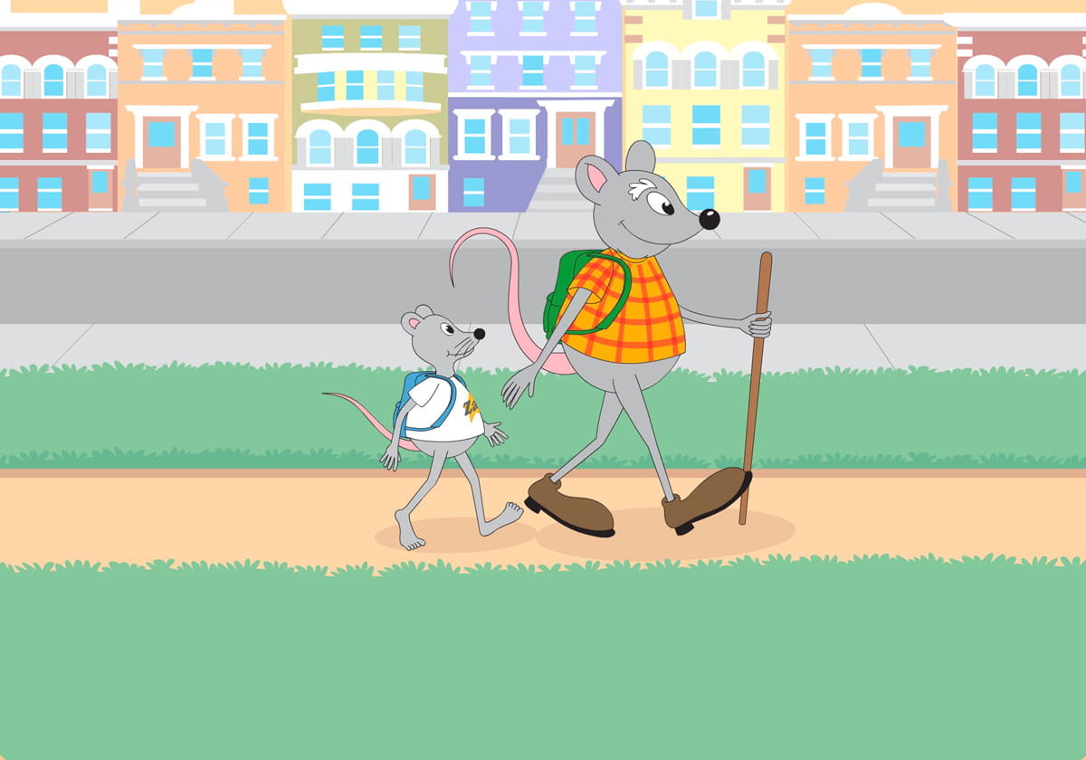 Zac and his dad walk down a path through the town.